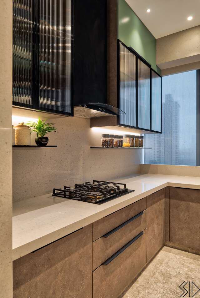Kitchen with fluted glass shutters and stone counter