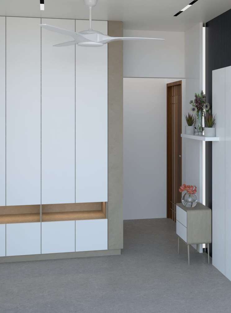 Floor-to-ceiling white wardrobes with an oak niche beside a bedroom door